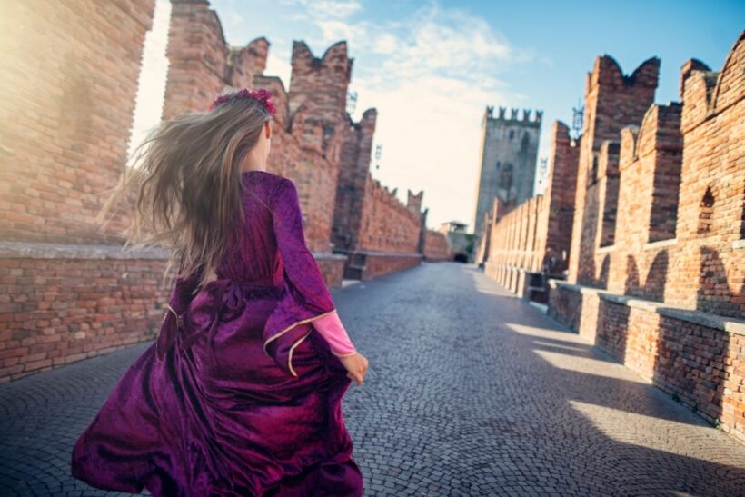 Little Juliet Capulet running on Verona bridge. Nikon D850.